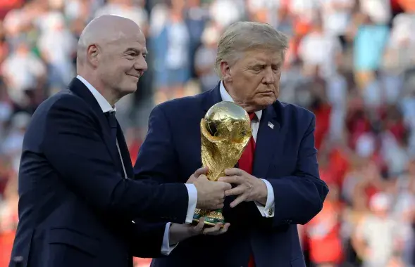 Джані Інфанціна і Дональд Трамп
